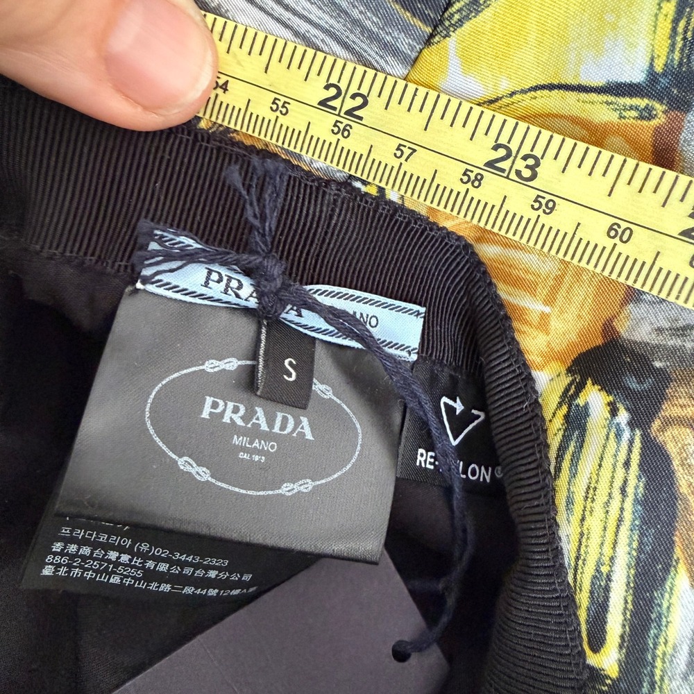 Prada Graphic Print Nylon Bucket Hat Black Gold Triangle Logo 1HC137 Size SM - Picture 7 of 8